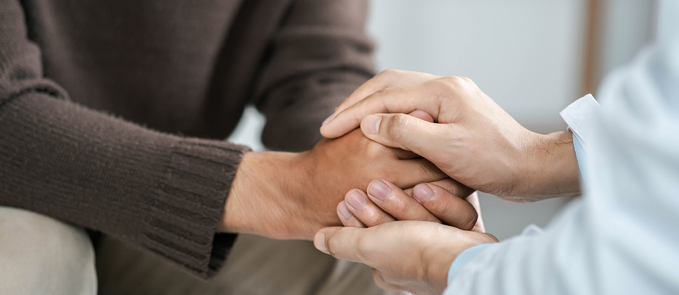 two people holding hands